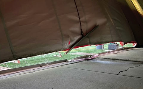 An exterior view of the Prairie Dome damage. The structure will be have to be taken down for repairs. Photo by Joe Perkl