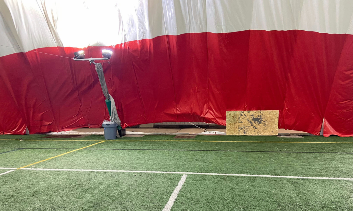 A view of the inside of the Prairie Dome showing the tear that occurred Tuesday night allowing air to leak. Photo by Joe Perkl