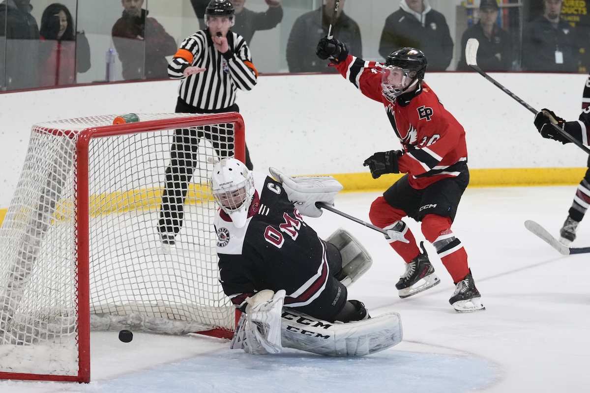 Owen Konrad scores the go-ahead goal late in the third period, helping Eden Prairie defeat Osseo-Maple Grove 4-2 in the Bantam AA State Tournament quarterfinals Friday at New Ulm Civic Center. Photo by Rick Olson